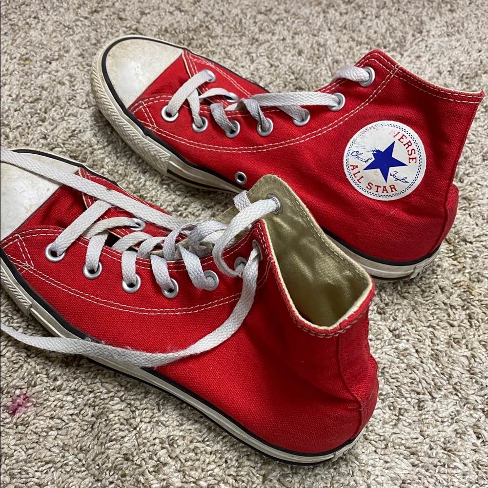 Red high top converse shoes